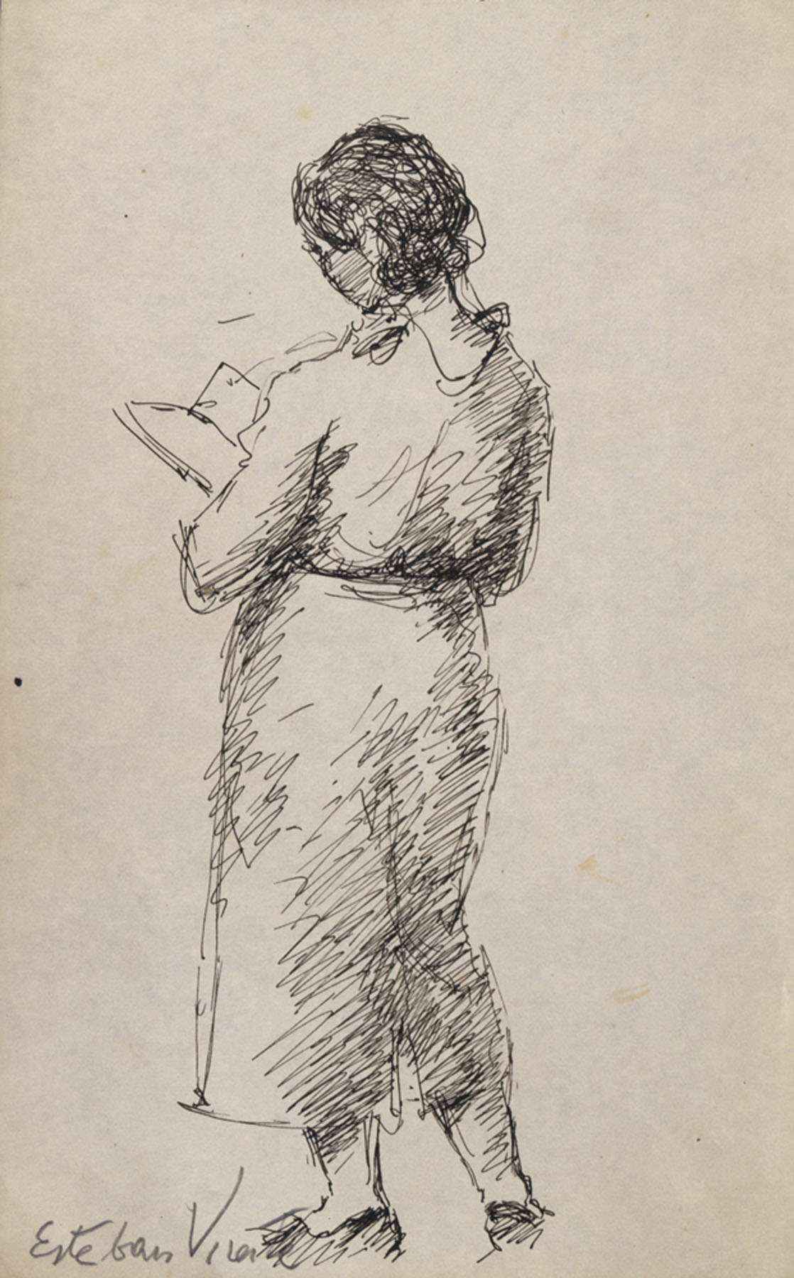 Woman standing reading a book
